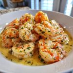Close-up of succulent shrimp coated in creamy garlic butter sauce and fresh parsley, Instant Pot Creamy Garlic Butter Shrimp Scampi.